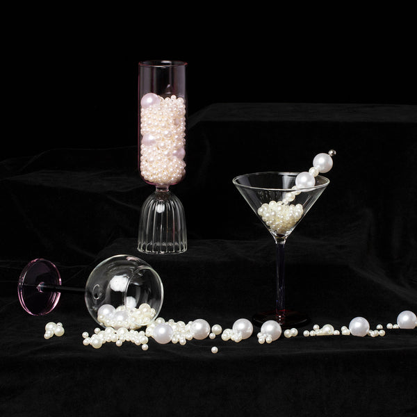 Photo of  the Tutu Flute, Piano Cocktail Glass and Bilboquet Wine Glass on a black background