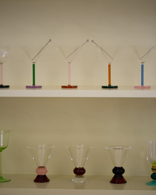 Photo of Piano Cocktail Glasses and Totem Glasses by Sphie Lou Jacobsen on a yellow-green background