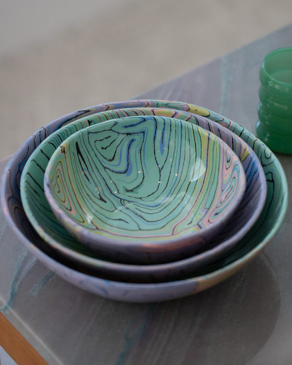 Photo of three Nerikomi Bowl No 228 by Slush Club in small, medium, and large