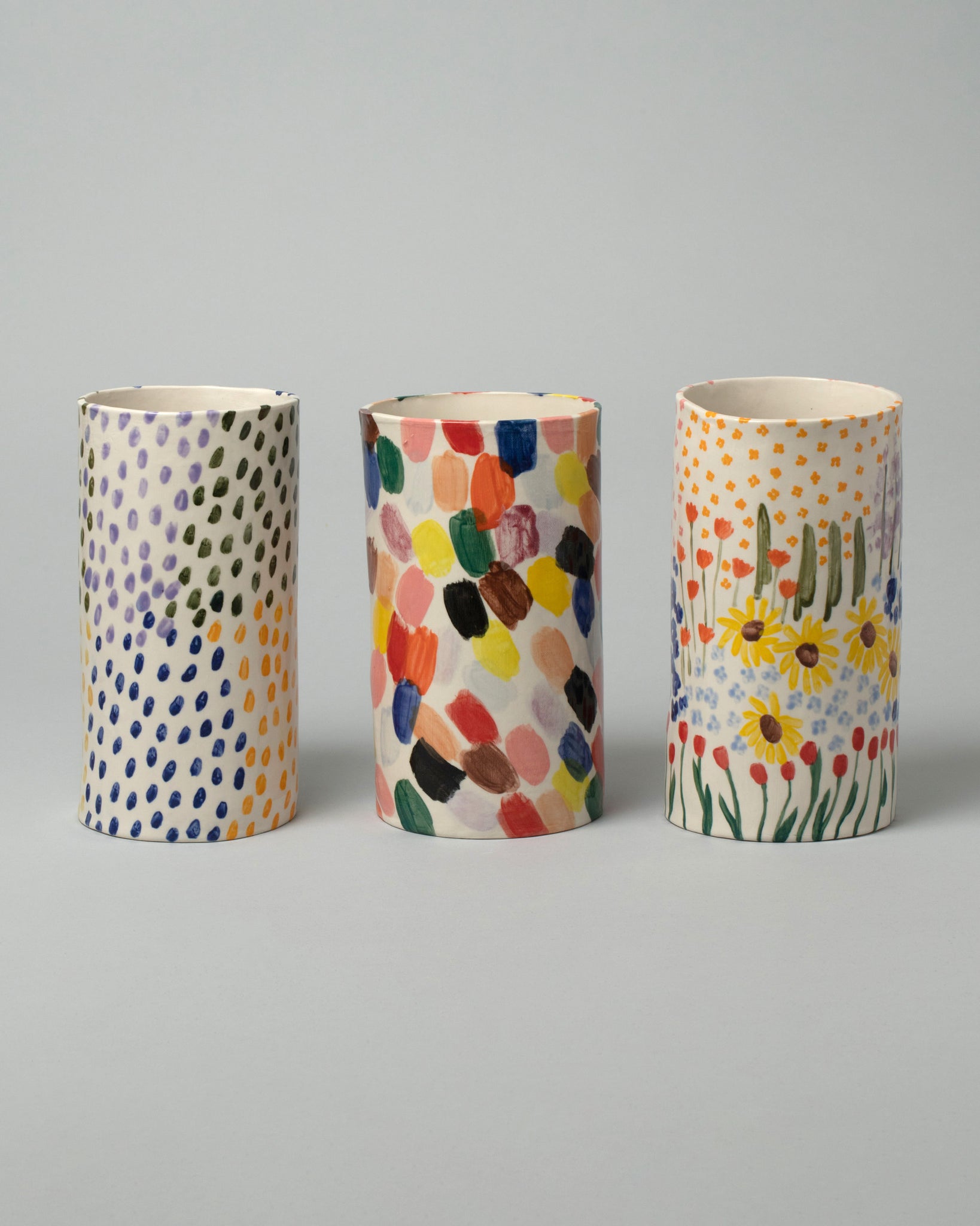Amanda Lucia Côté Collection vases on a neutral-light background.