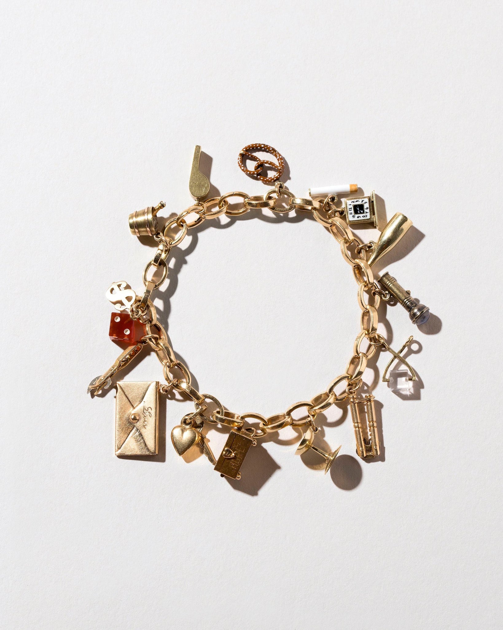Mociun Charms & Chains Collection bracelet on a neutral-light background.