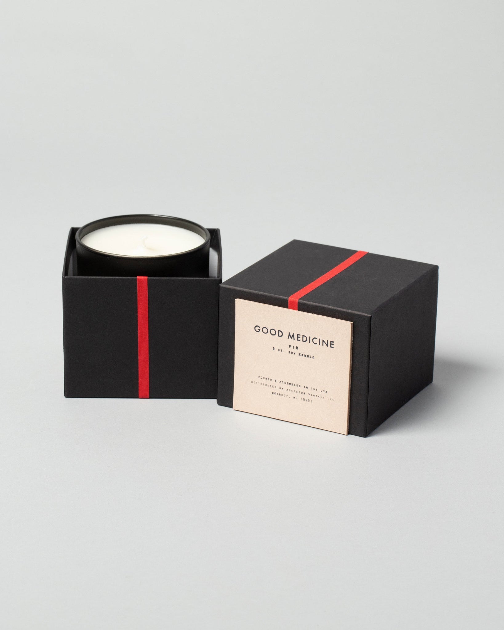 Product photo of a Good Medicine candle on a neutral-light background.