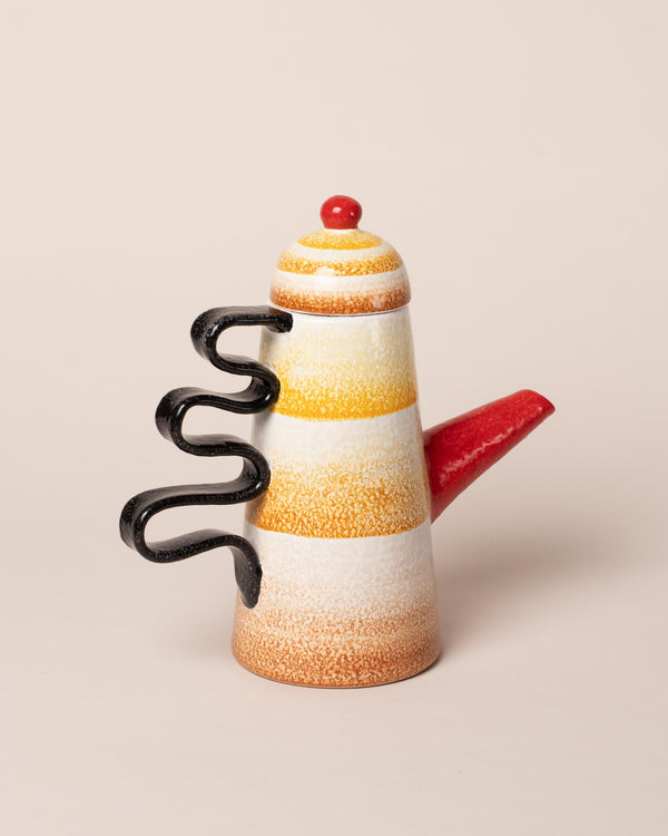 Mazzotti Collection vessel with yellow, black and red details, on a neutral-light background.
