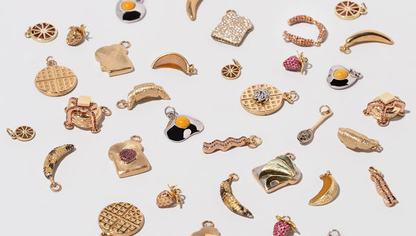 Fine Foods Collection enamel charms on a neutral-light background.