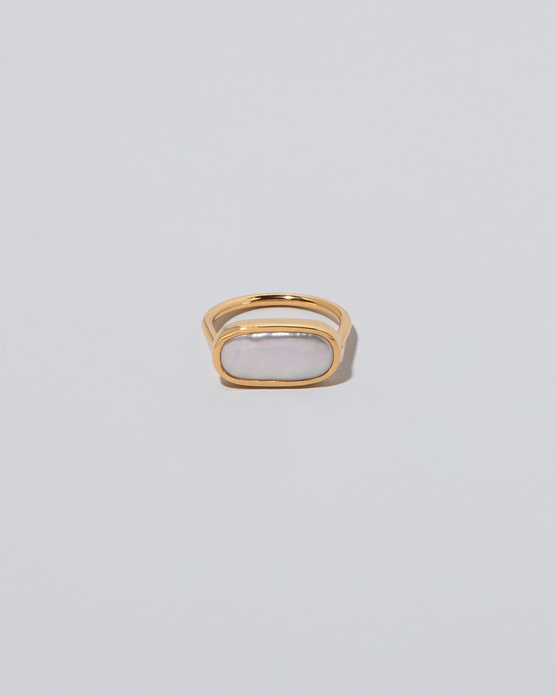 18k Gold Anhinga Pearl Ring on light color background.