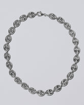 11.9mm Silver Puffed Mariner Chain on light color background.