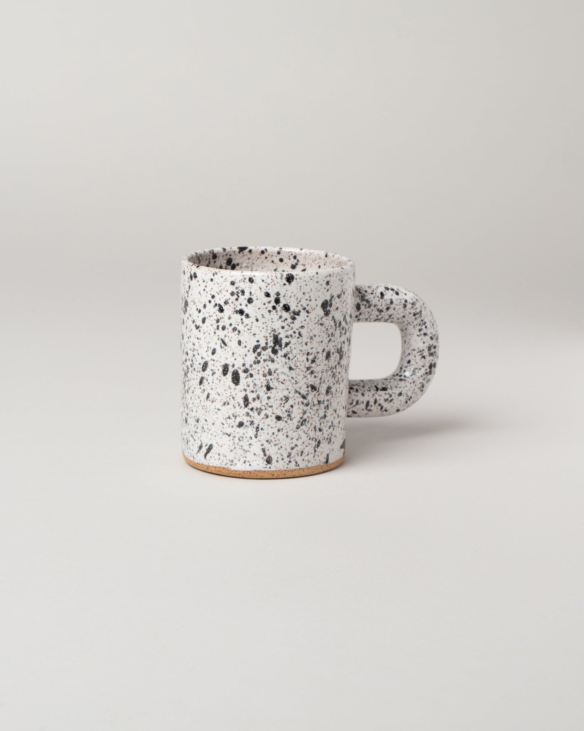 Recreation Center Speckled Simple Mug on light color background.