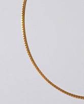 Closeup detail of the Lightweight Chevron Chain on light color background.