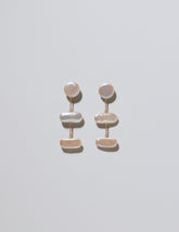 Kittiwake Earrings on light color background.