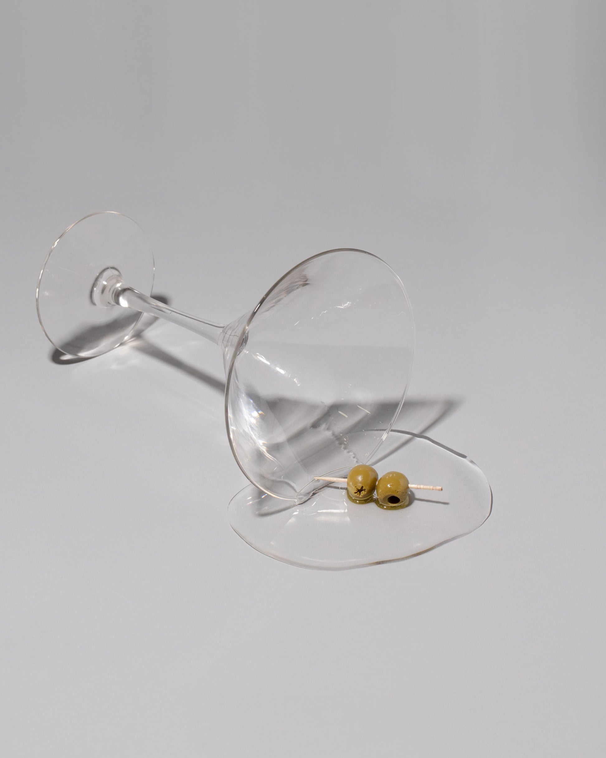 Spills Faux Dirty Martini Spill on light color background.