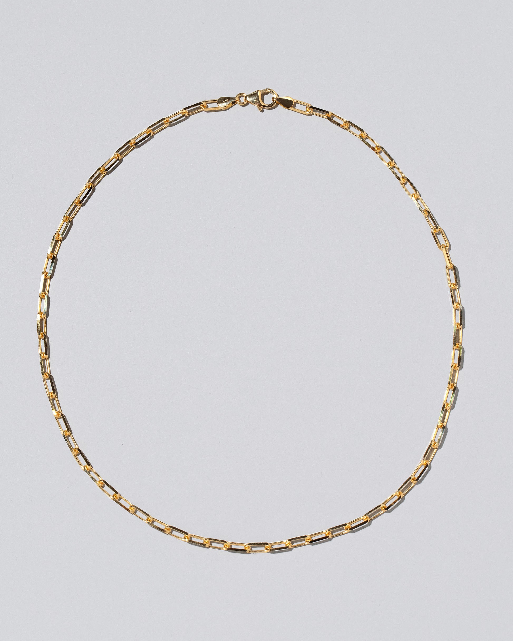 3.5mm Lightweight Beveled Oval Chain Necklace on light color background.