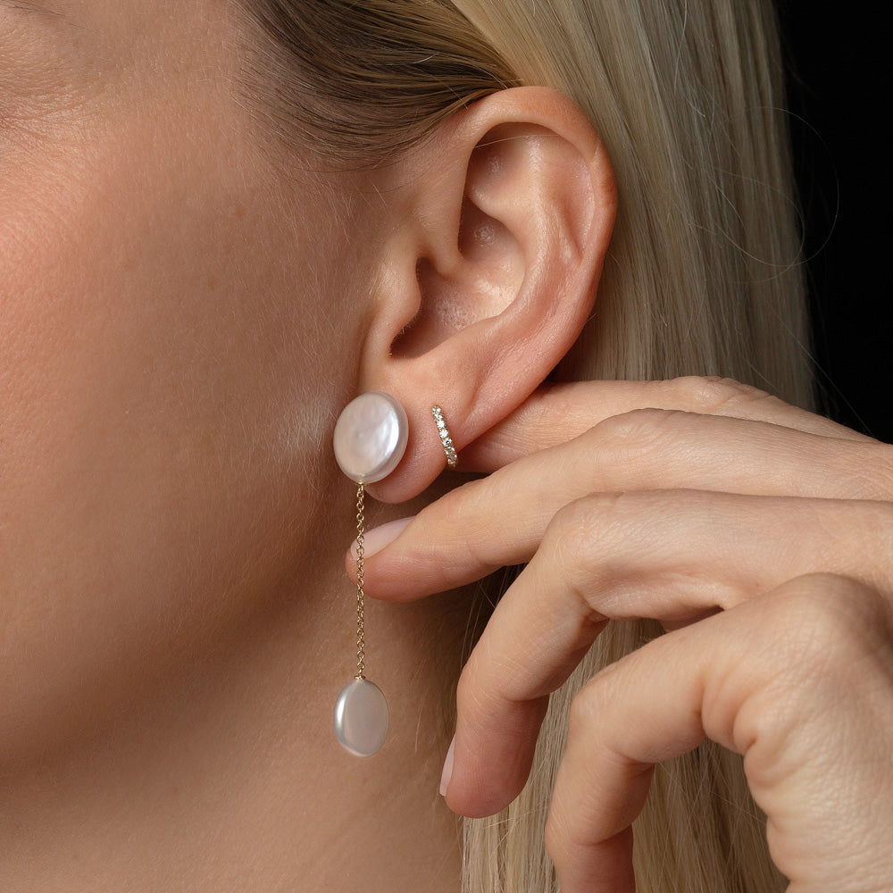 product_details::Plover Pearl Earrings on model.