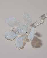 Closeup details of the Alex Rosenbaum Ghost Glass Flower on light color background.