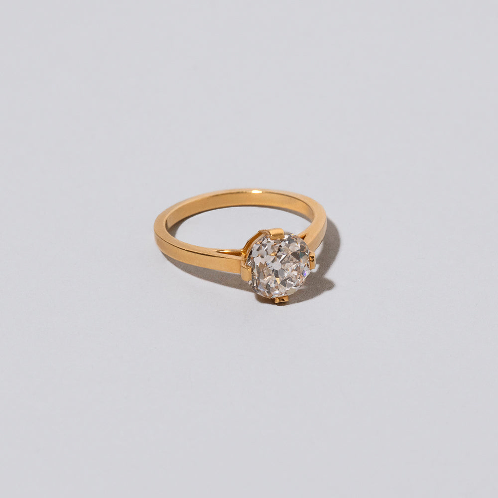 product_details::Closeup details of the Super White Diamond Barragán Ring on light color background.