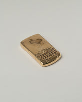 Pearce Objects Cast Bronze Blackberry Curve on light color background.
