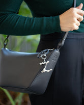 CRZM Sterling Silver Letter Z Bag Charm on model.