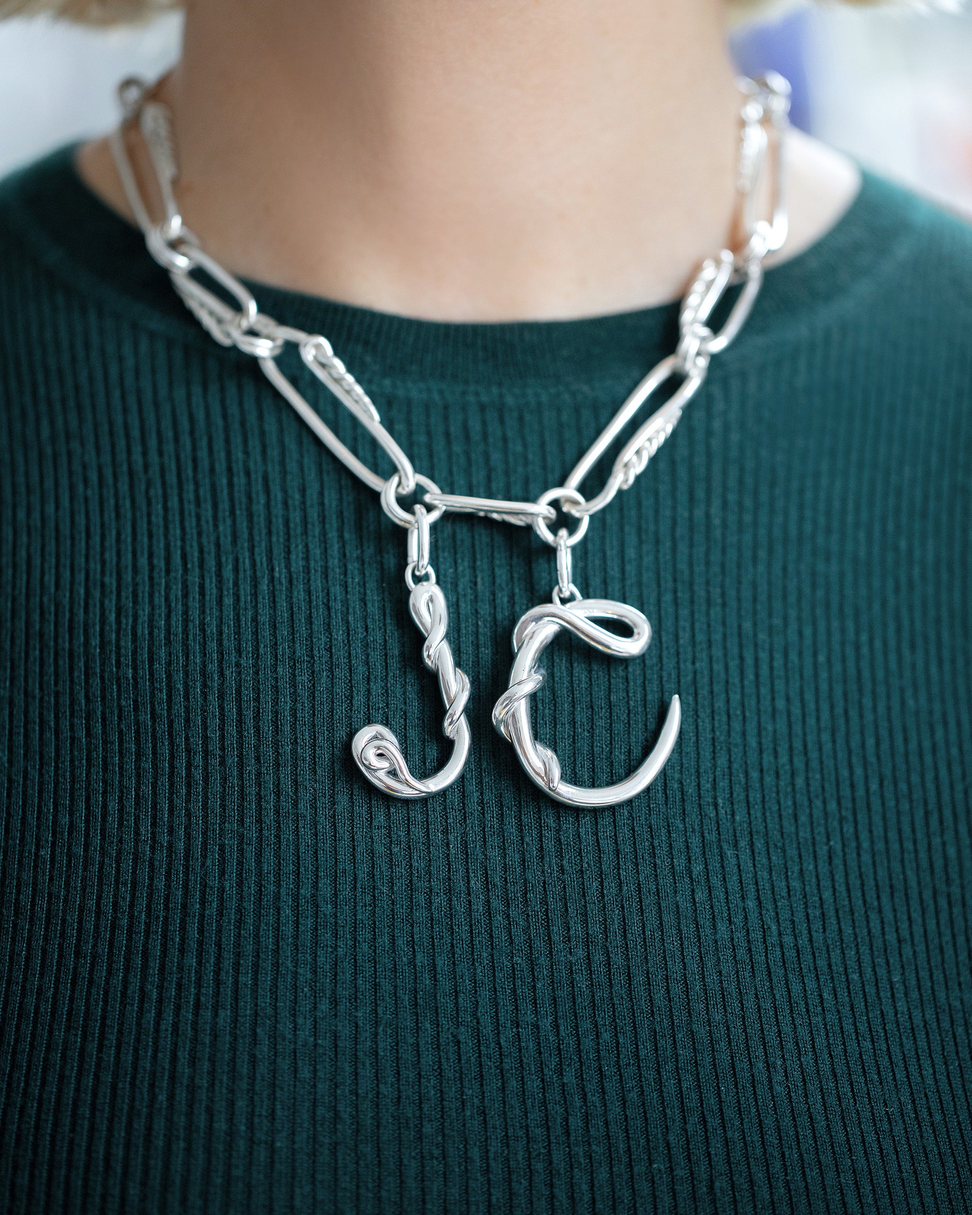 CRZM Sterling Silver Canyon Necklace and CRZM Letter J and Letter C Large Sterling Silver Letter Charms on model.