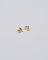 Shape One Thousand & One Night Heart Stud Earrings on light color background.