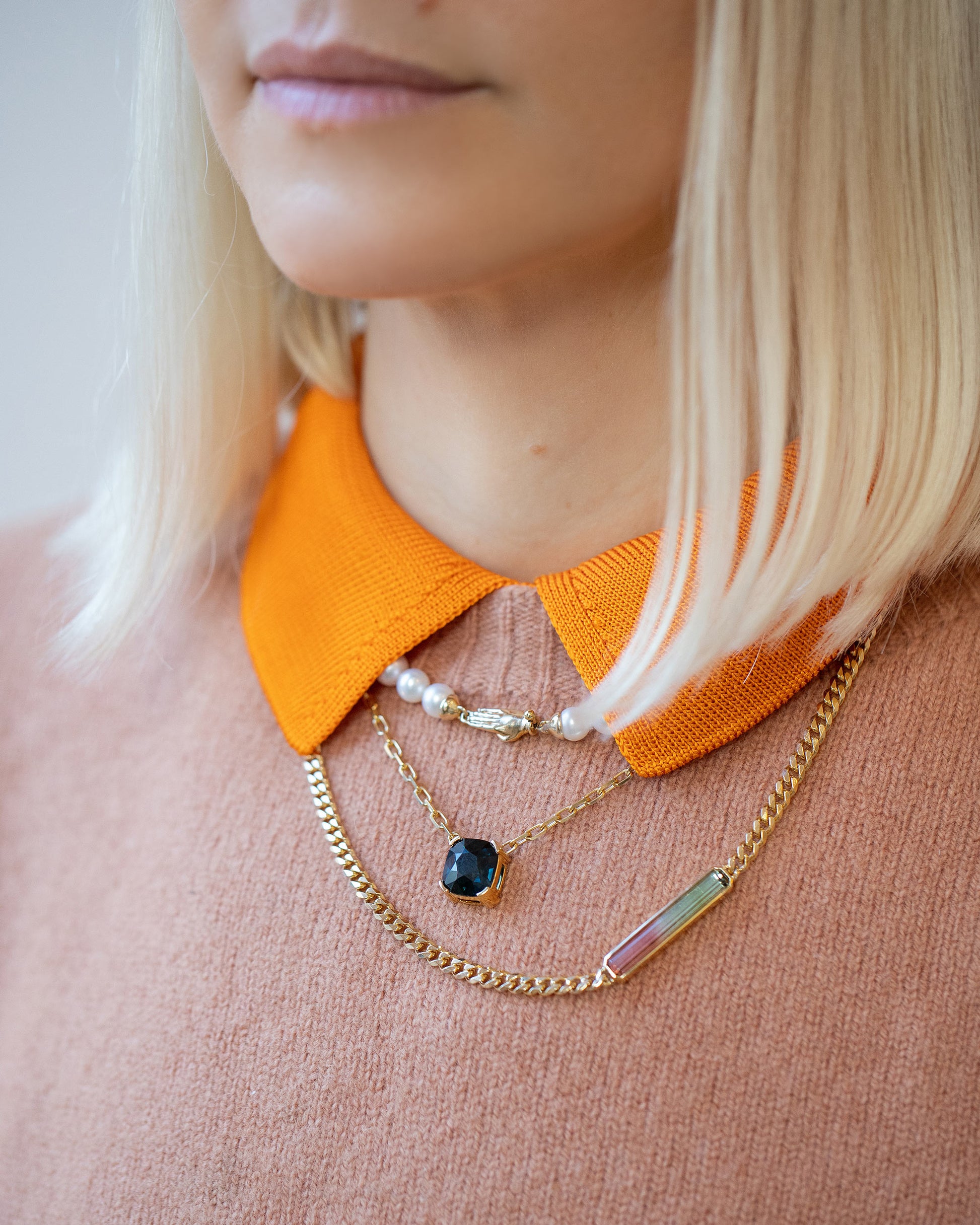 Gold White Union Necklace, Awareness Necklace and Deliverance Necklace model.