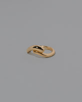View from the side of the Gold Align Band on light color background.