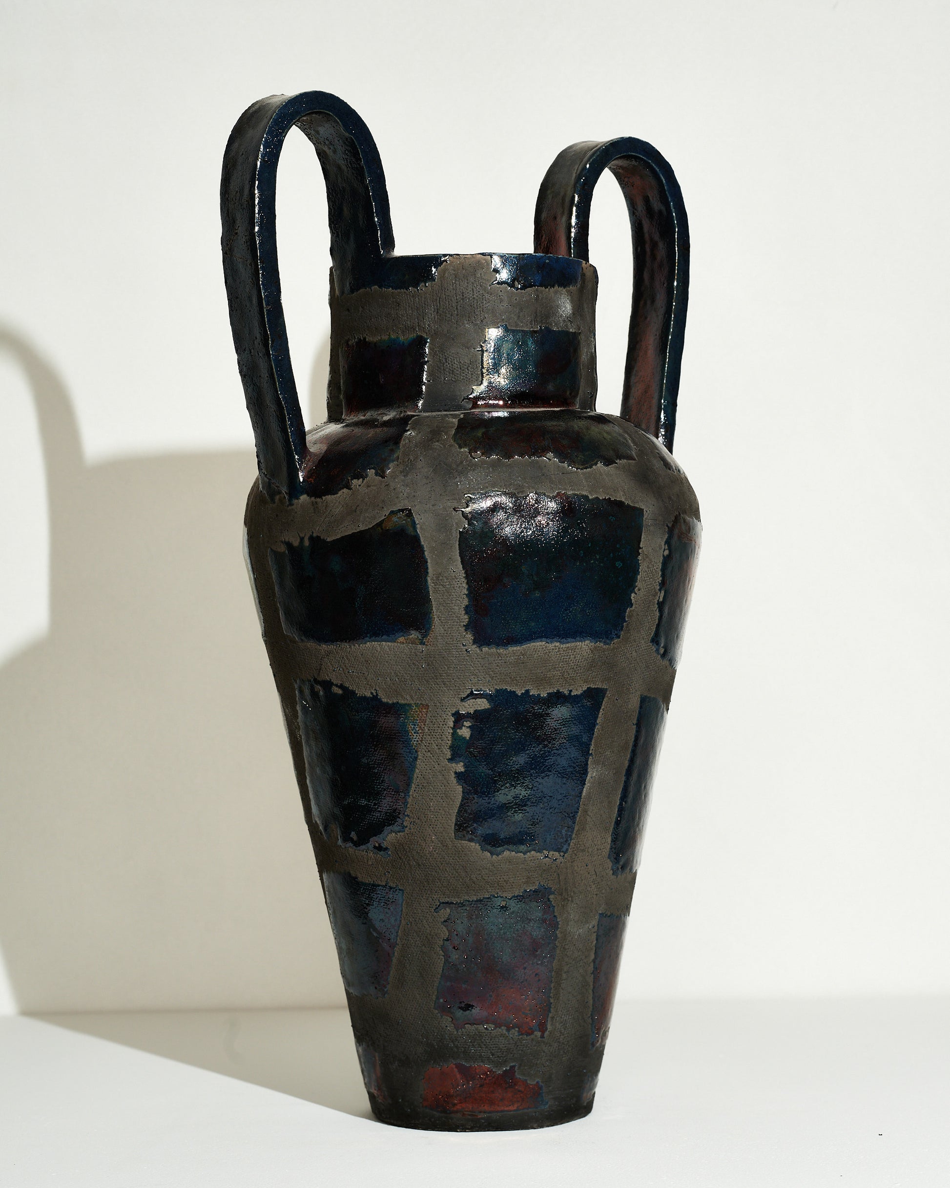 Emily Mullin Grid I Vessel on light color background.