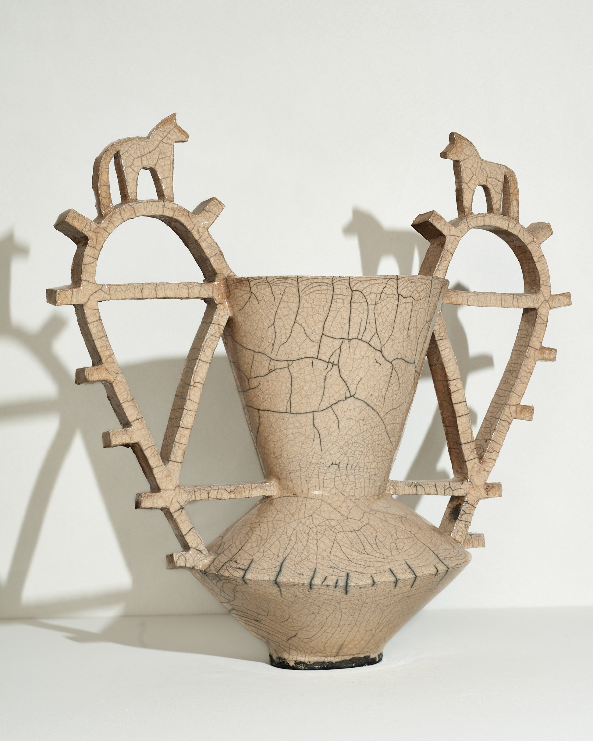 Emily Mullin Horses Vessel on light color background.