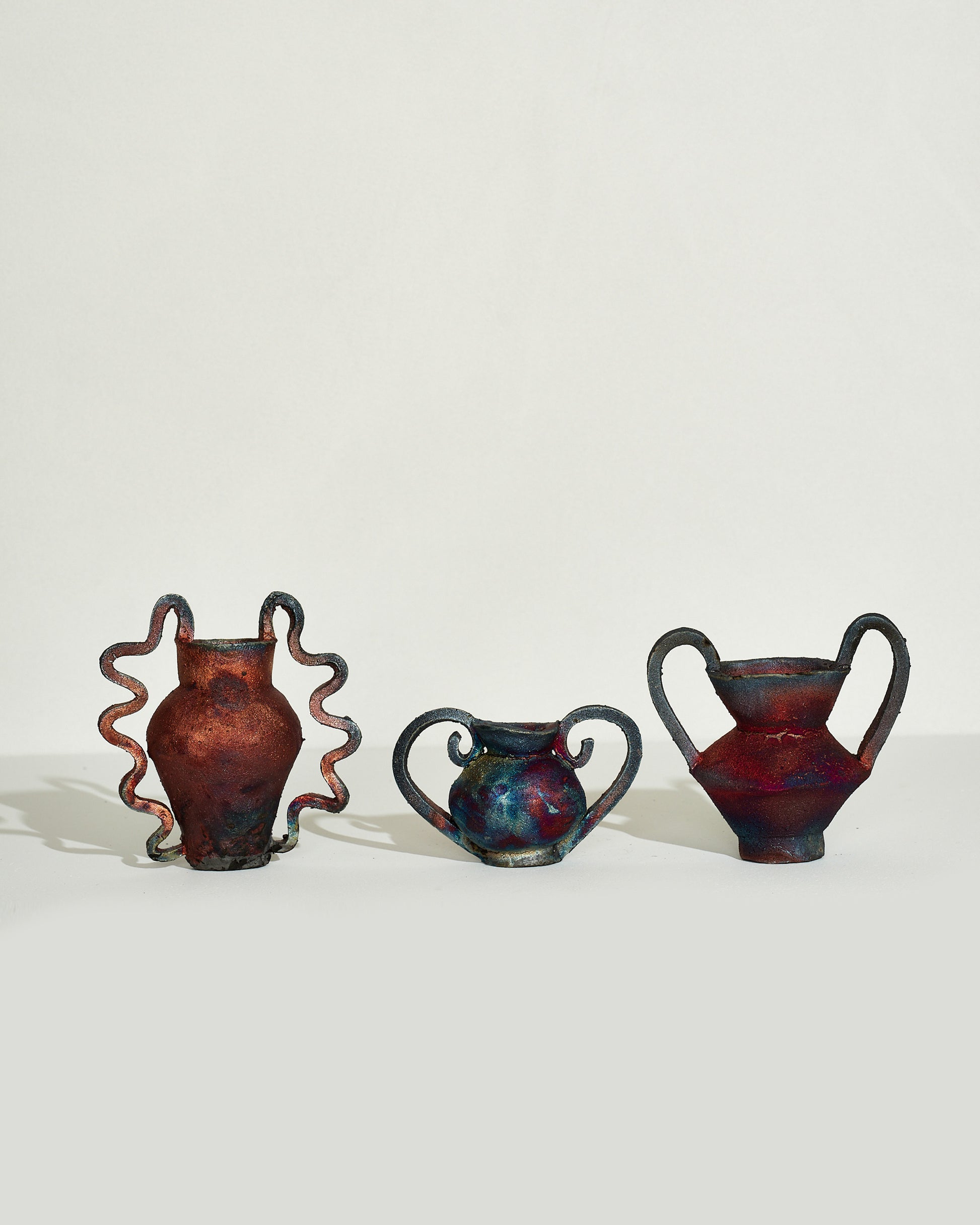 Emily Mullin I Mini Vessel, Emily Mullin II Mini Vessel and Emily Mullin III Mini Vessel from left to right on light color background.