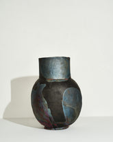 Emily Mullin Indigo Raku Vessel IV on light color background.