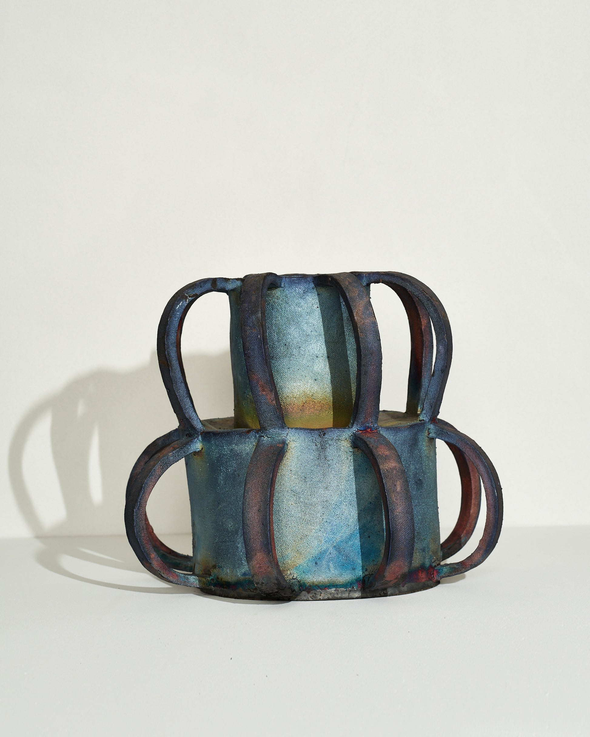 Emily Mullin Multihandled Vessel on light color background.