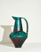Emily Mullin Raku Pitcher II on light color background.