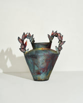 Emily Mullin Roman Garden Vessel on light color background.