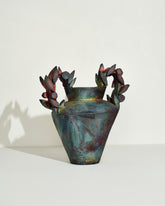 Emily Mullin Roman Garden Vessel on light color background.