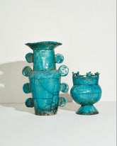 Emily Mullin Turquoise Birds Vessel on light color background.