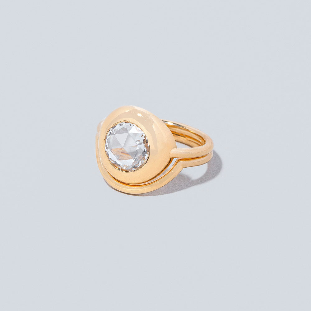 product_details::Grand Exposition Ring and Exposition Band on light color background.