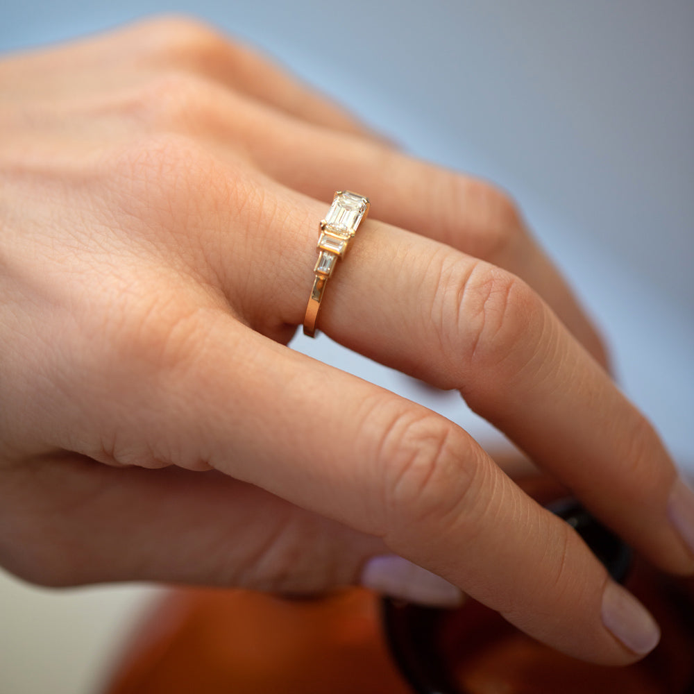 product_details::Gold Diamond Expression Ring on model.