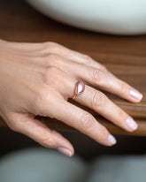 Gusher Pink Sapphire Ring 011 on model.