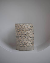 Suzanne Sullivan No Nonsense Reliability Pedestal on light color background.