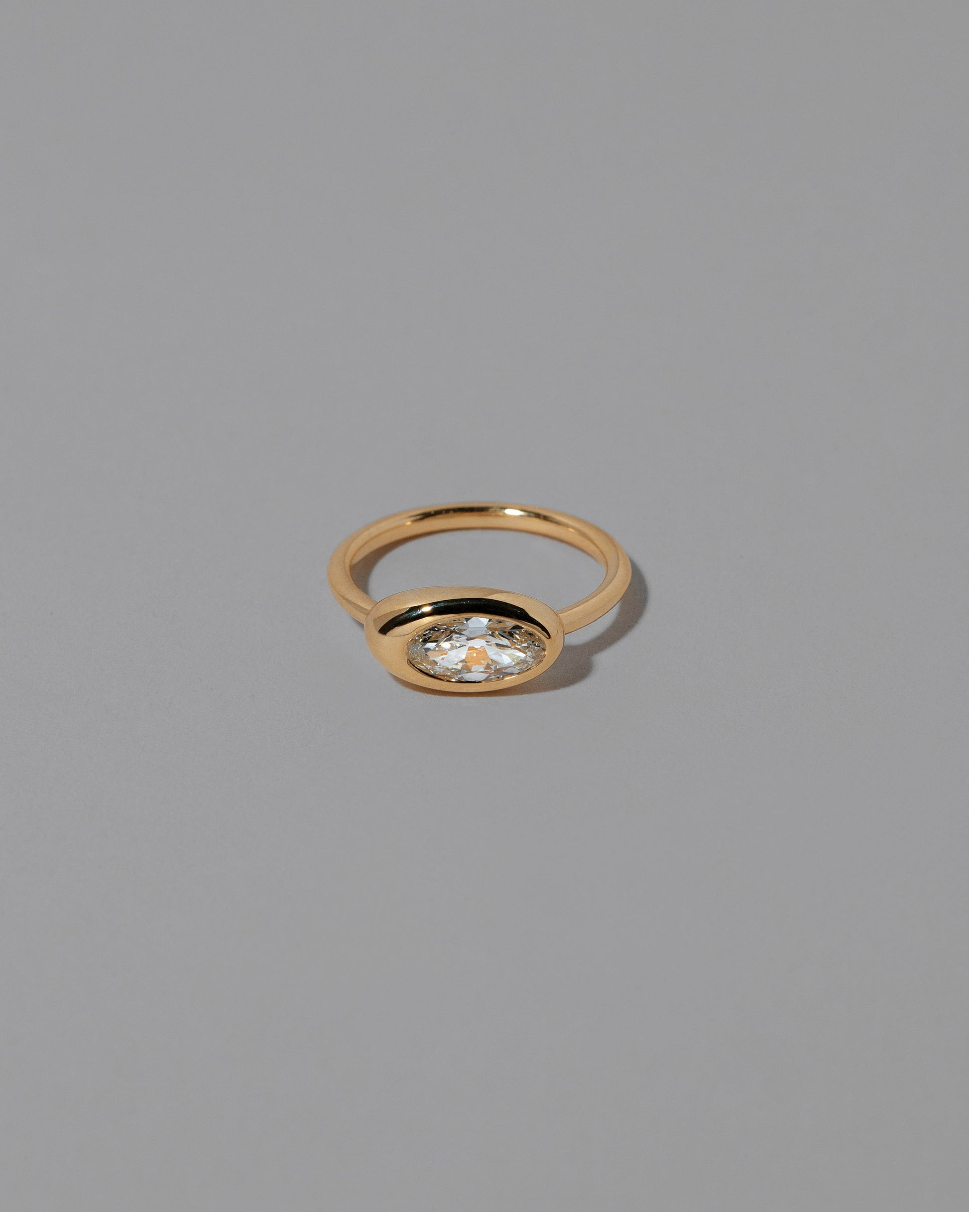 Moval White Diamond Equalize Ring on light color background.