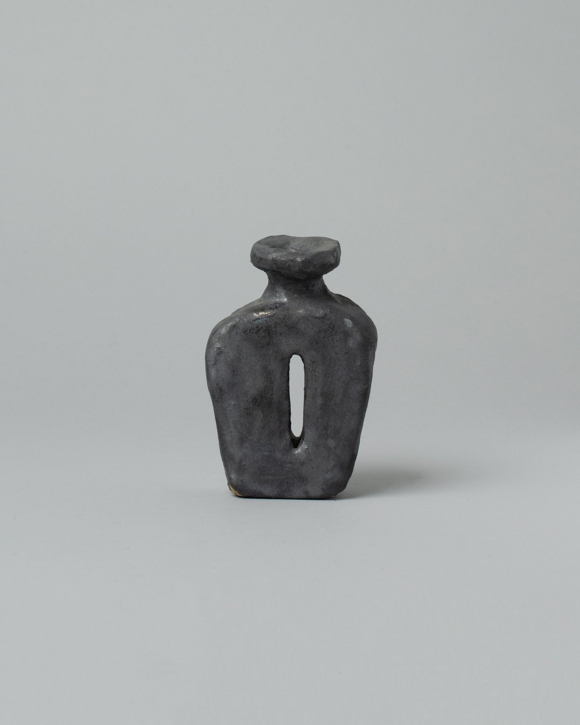 Willem van Hooff Matte Charcoal Extra Small Core Sculpture on light color background.