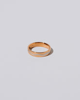 5mm Rose 18K Outside and Platinum Inside Swimming Pool Band on light color background.