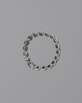 CRZM Sterling Silver Mini Bedrock Bracelet on light color background.