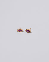 Magenta Big Kiss Stud Earrings on light color background.