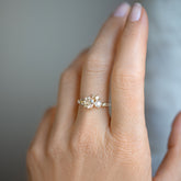 product_details::Champagne Diamond Luna Ring on model.