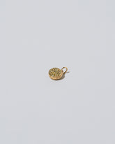 Mini Macaron Charm - Diamond Pavé Pistachio on light color background.