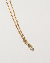 Swivel Fob with Chain on light color background.