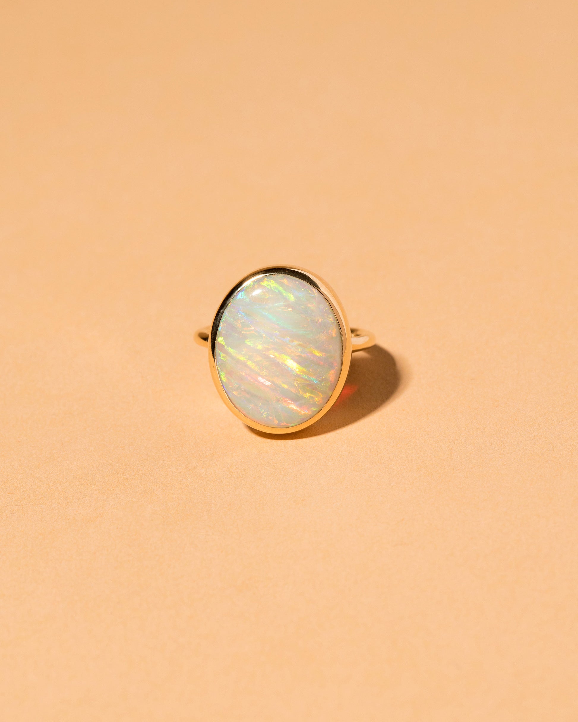 Australian Opal Ring on light color background.