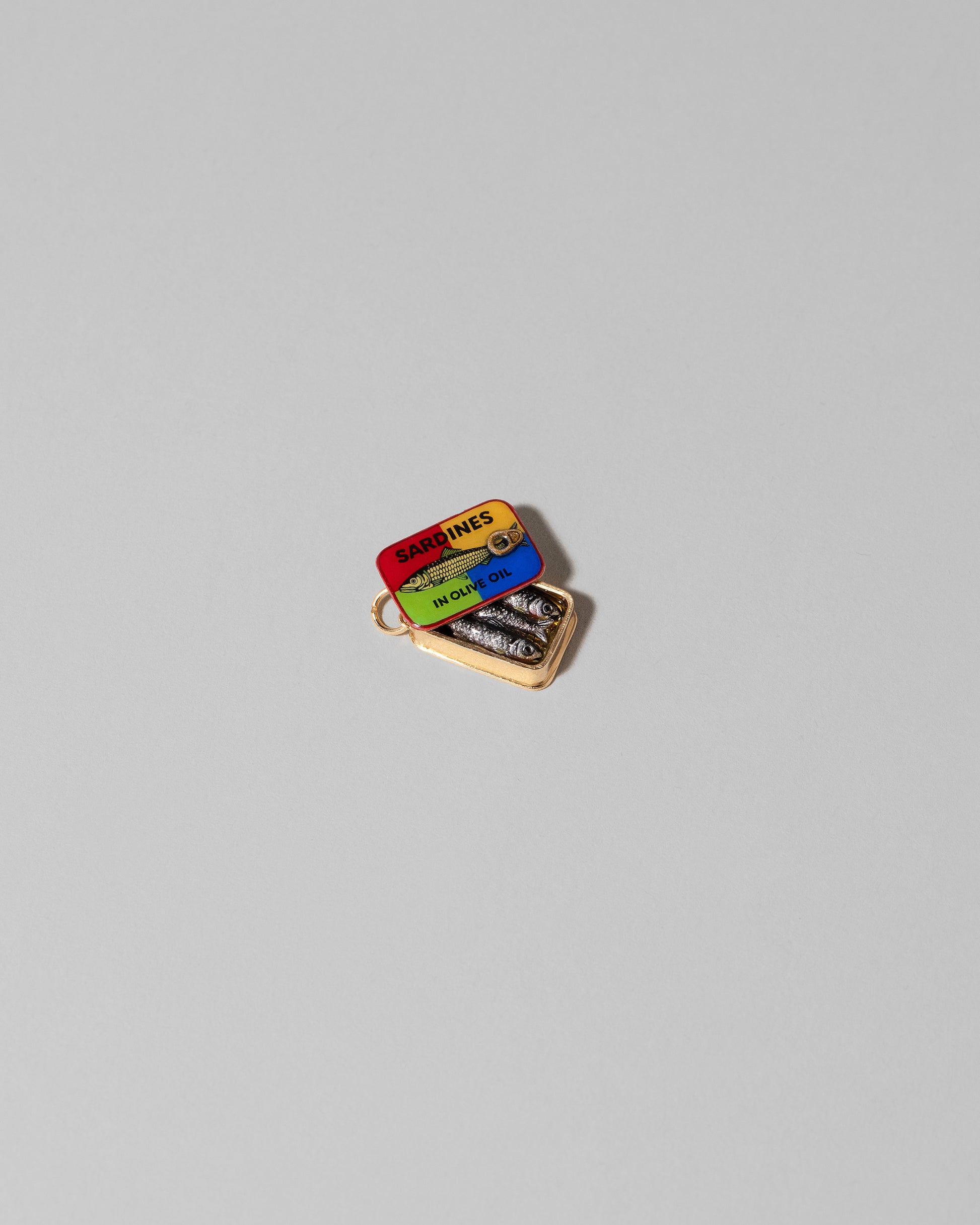 Sardine Can Charm on light color background.