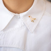 product_details::Henrietta Duck Brooch on model.