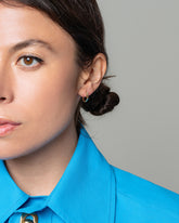 Madrone Flower Bud Hoop Earrings on model.