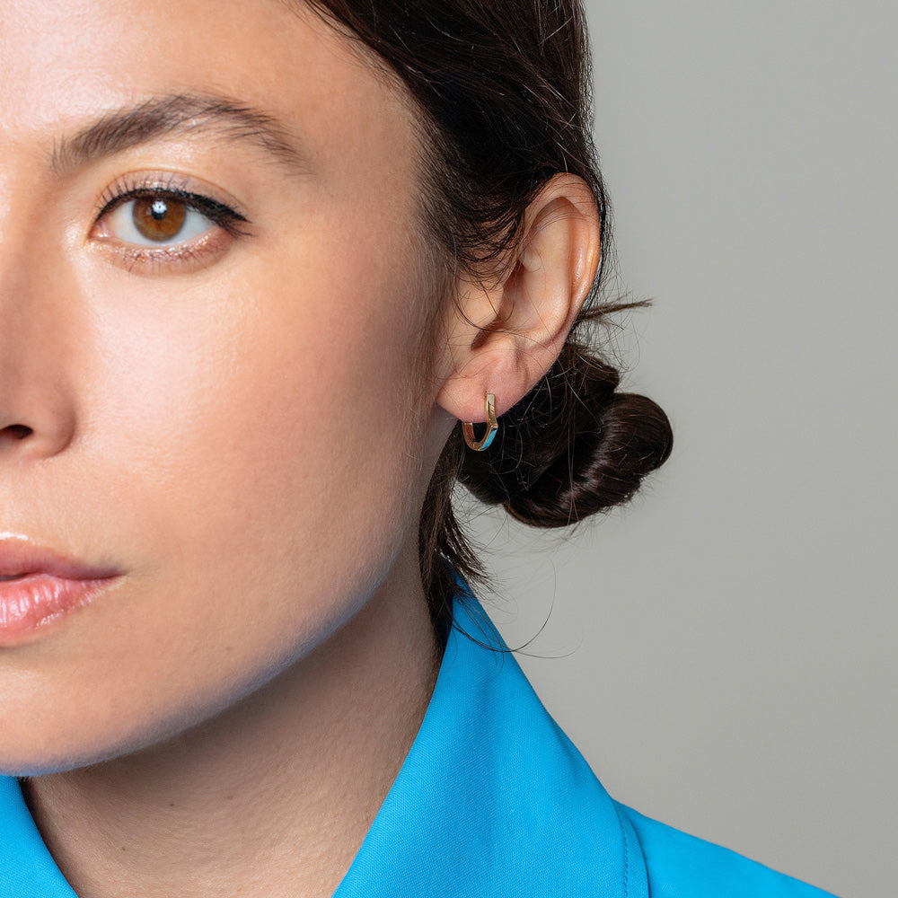 product_details::Madrone Flower Bud Hoop Earrings on model.